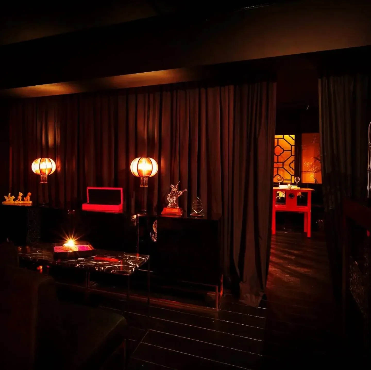Interior of A. Wong in London: elegant design with lanterns and warm lighting.