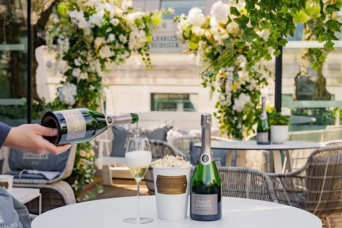 Champagne pouring at Angler restaurant in London, a perfect pairing with popcorn.