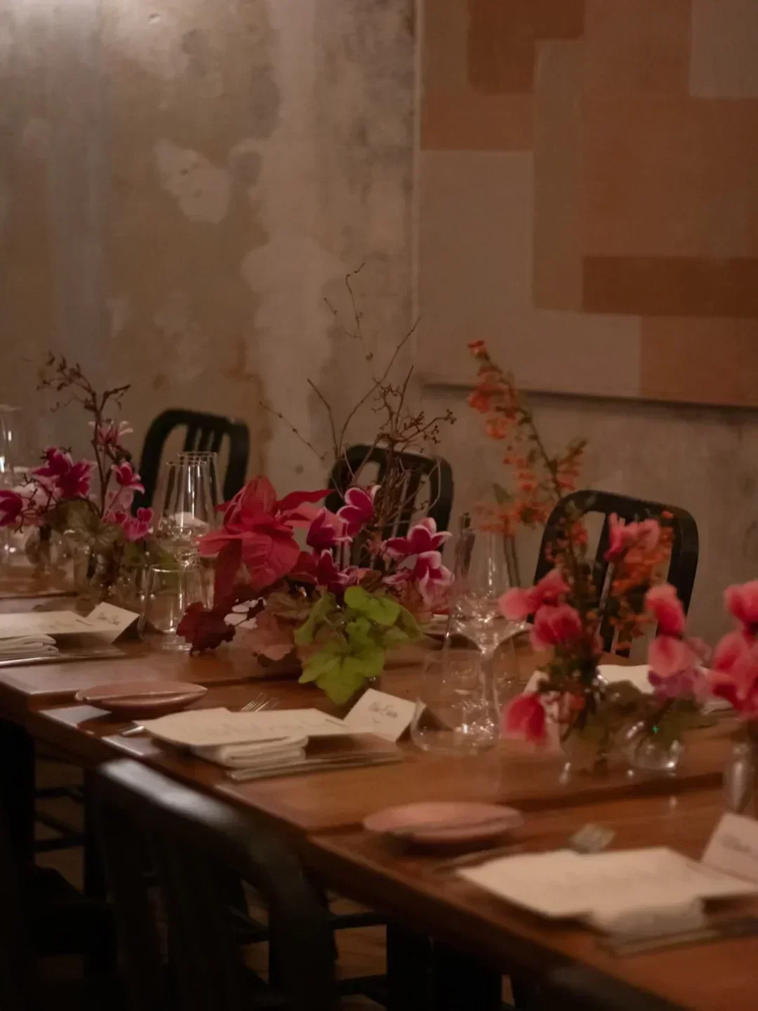 Apricity restaurant in London: beautifully decorated table with floral arrangements.