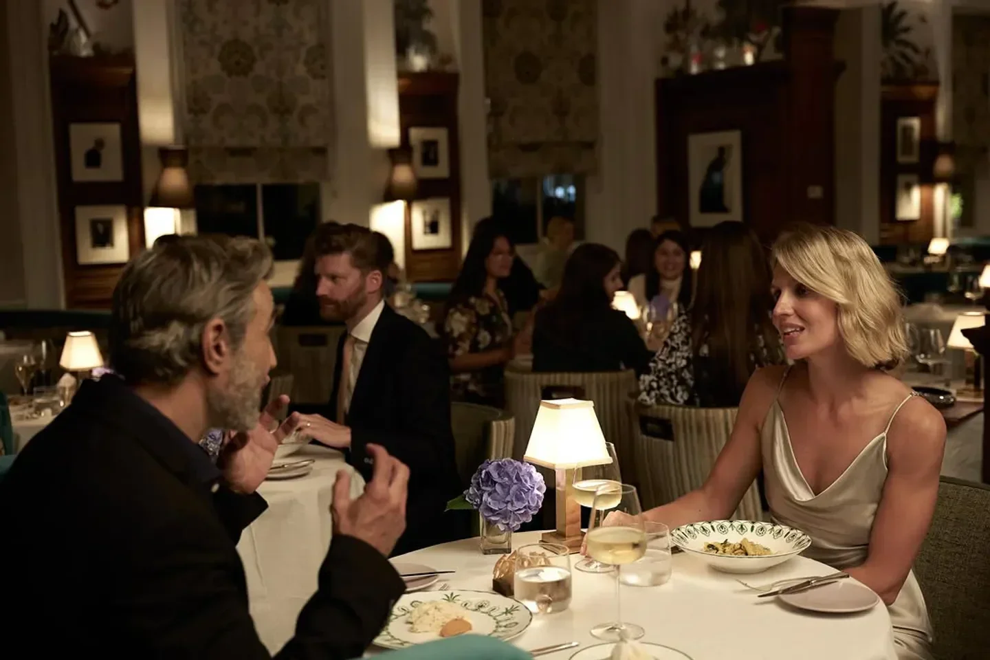 Elegant dining at Chez Bruce restaurant in London, with a focus on diners and ambiance