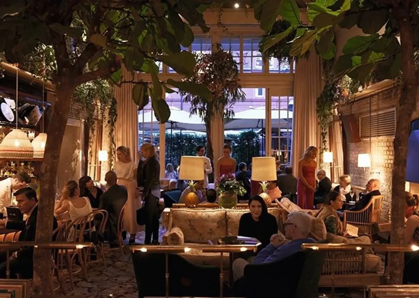 Interior of Chiltern Firehouse restaurant in London with elegant decor and patrons