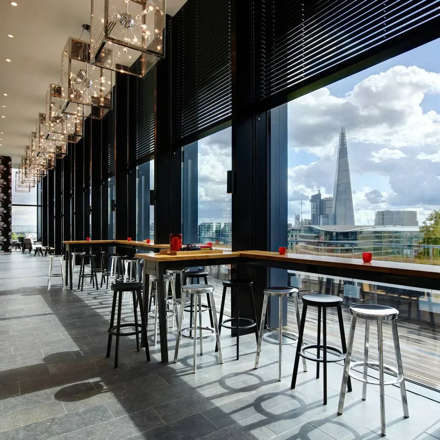 cloudM rooftop bar in London with city views, stylish seating, and modern decor.