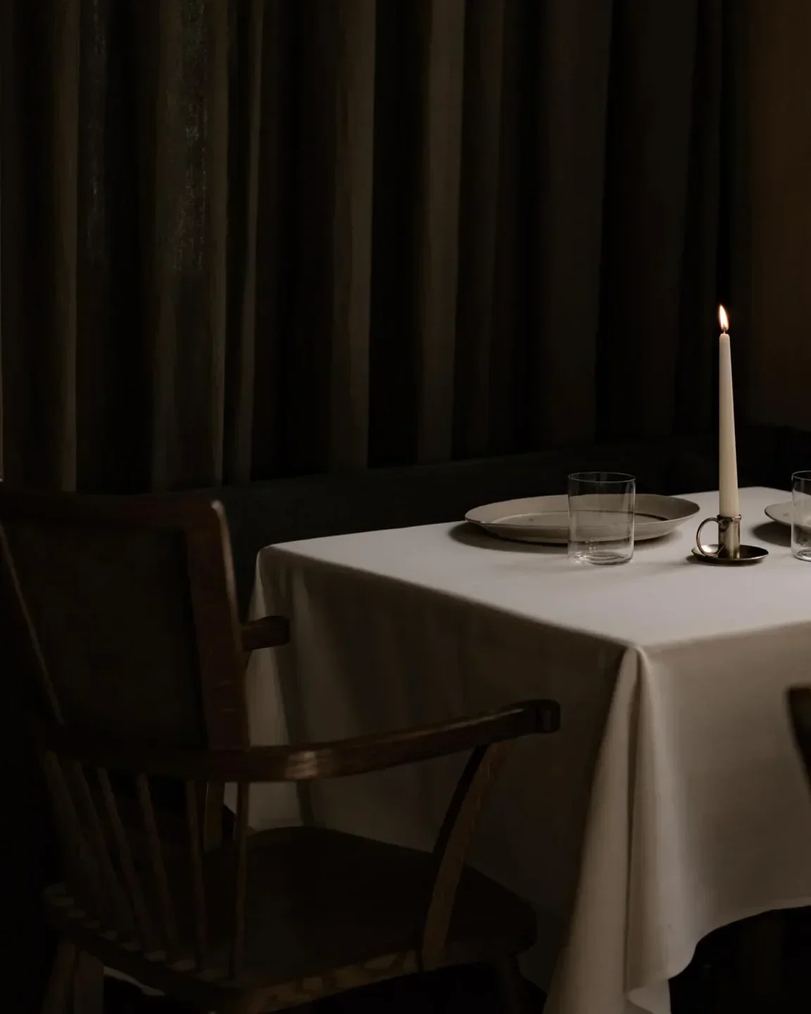 Candlelit table setting at Cycene restaurant in London, elegant and inviting.