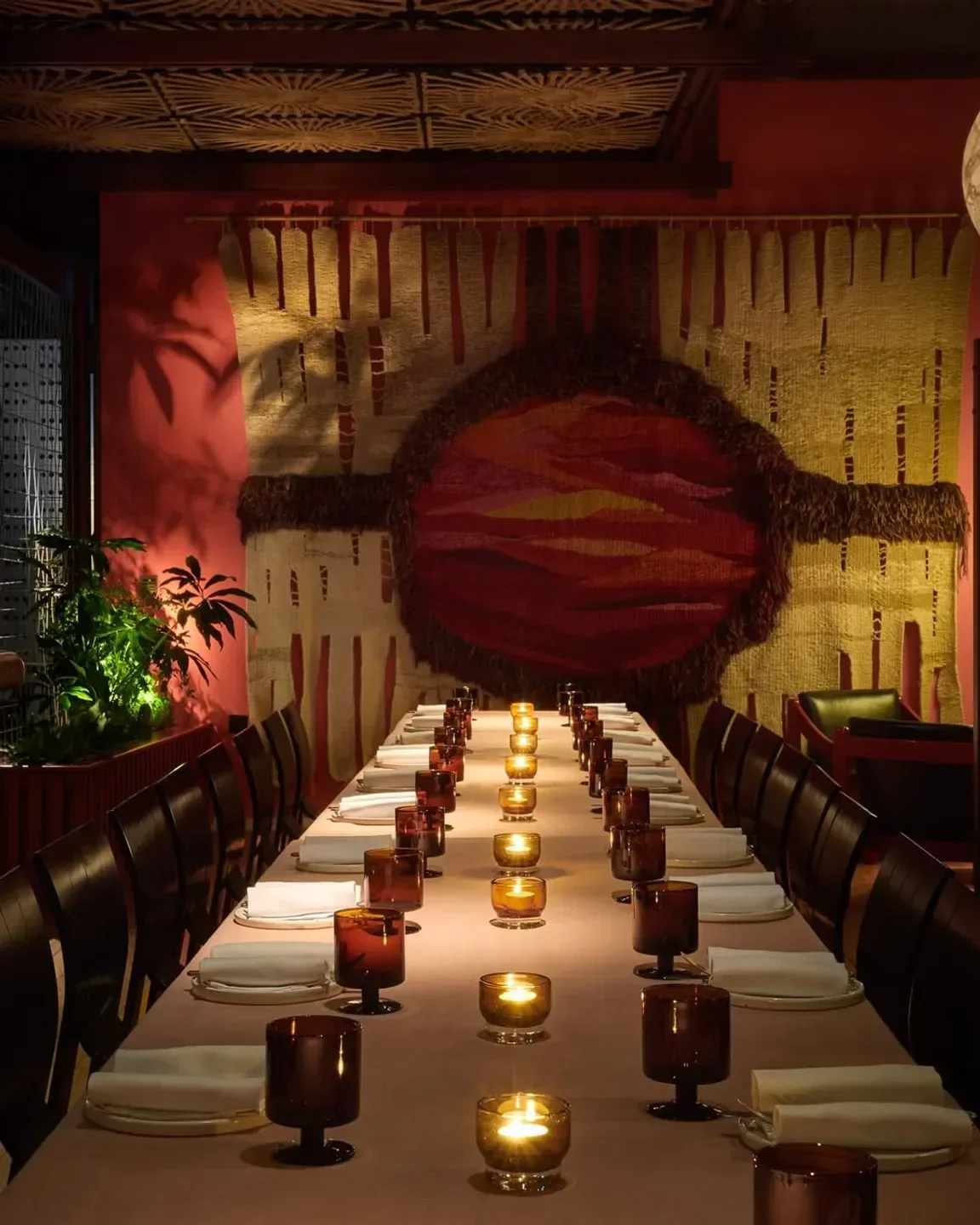 Candlelit table at Decimo restaurant in London, with a vibrant and cozy atmosphere.
