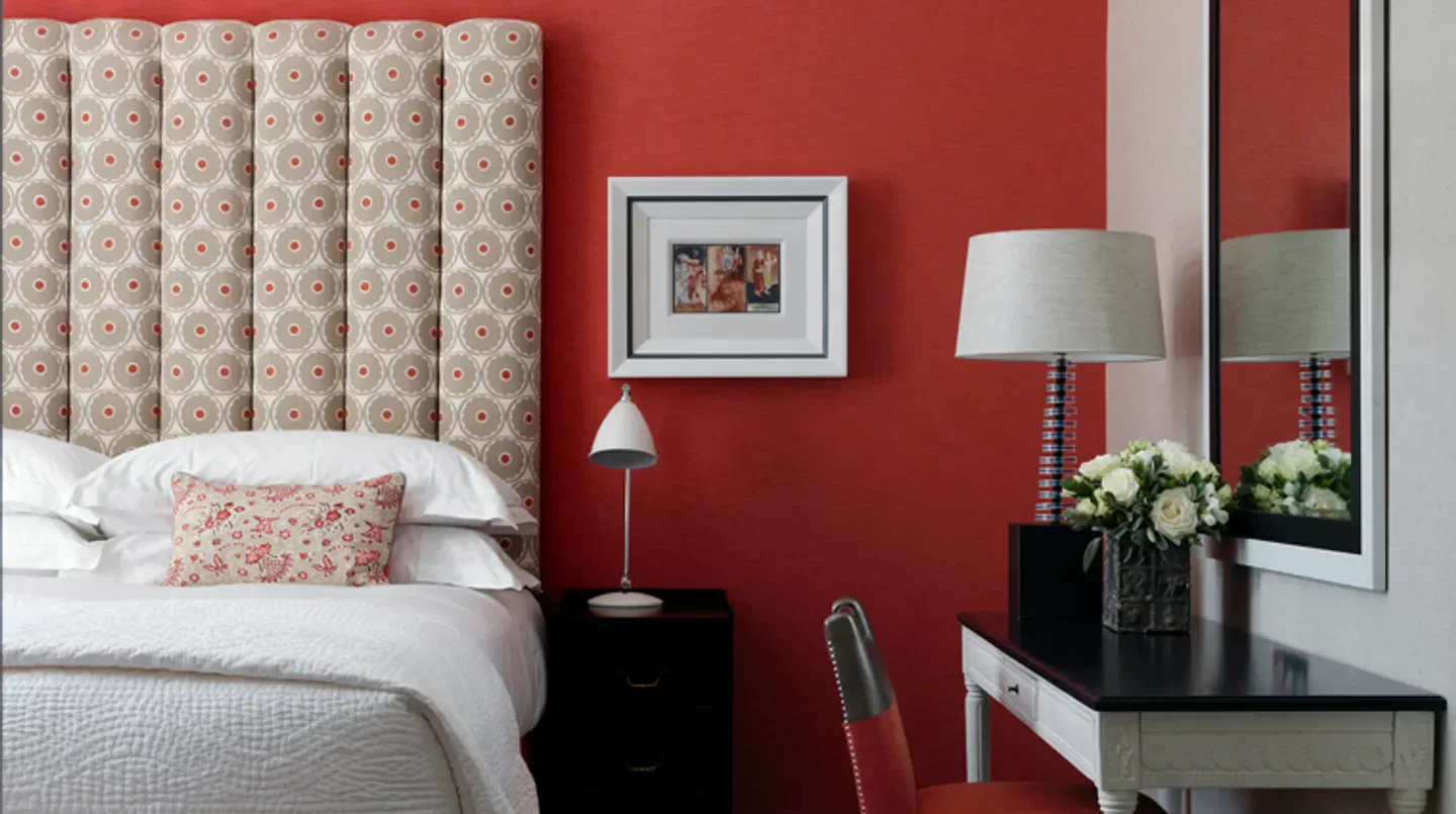 Elegant bedroom at Dorset Square Hotel in London, featuring stylish decor and design.