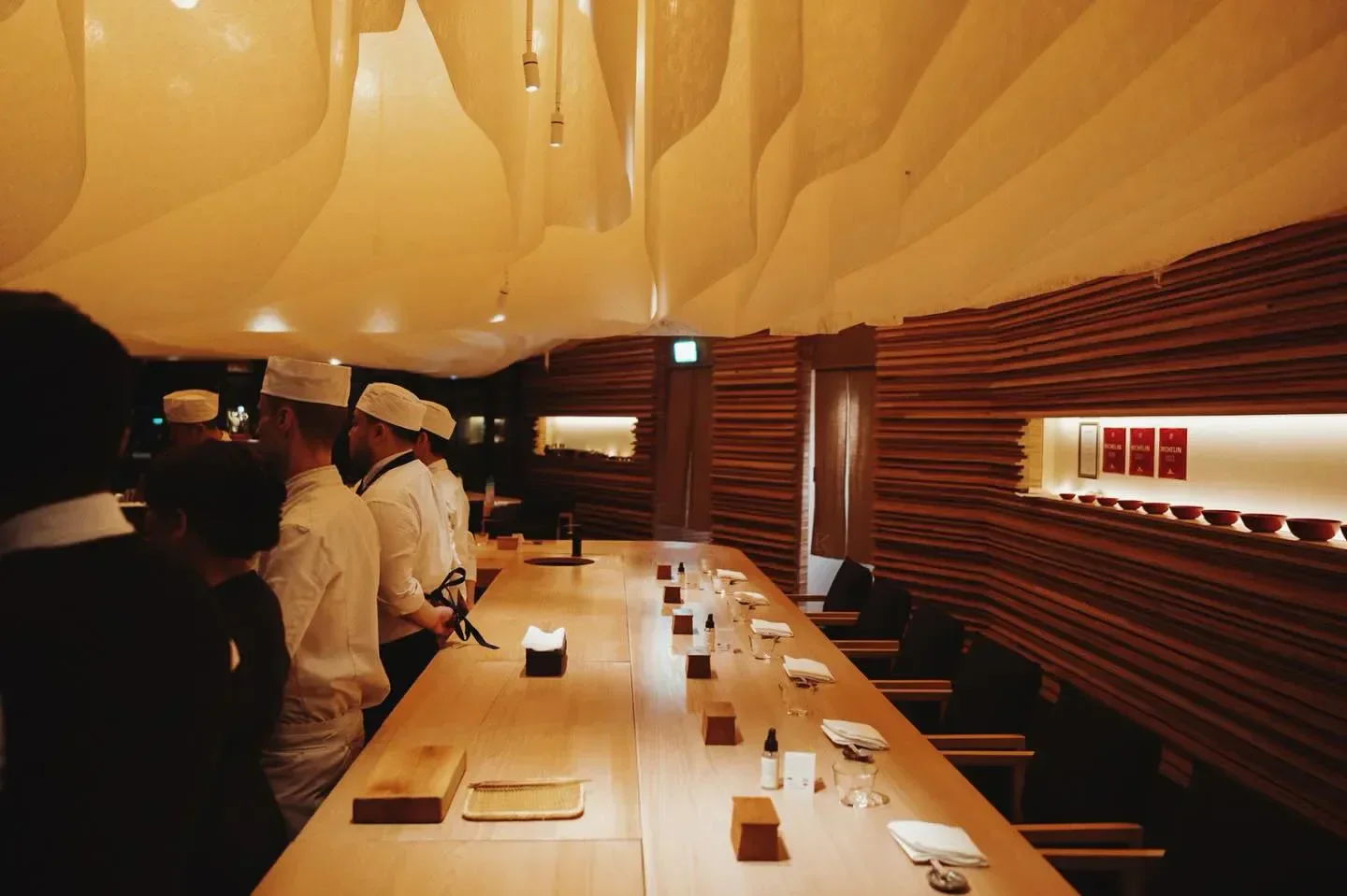 Chefs preparing food at Endo at The Rotunda, a high-end restaurant in London.