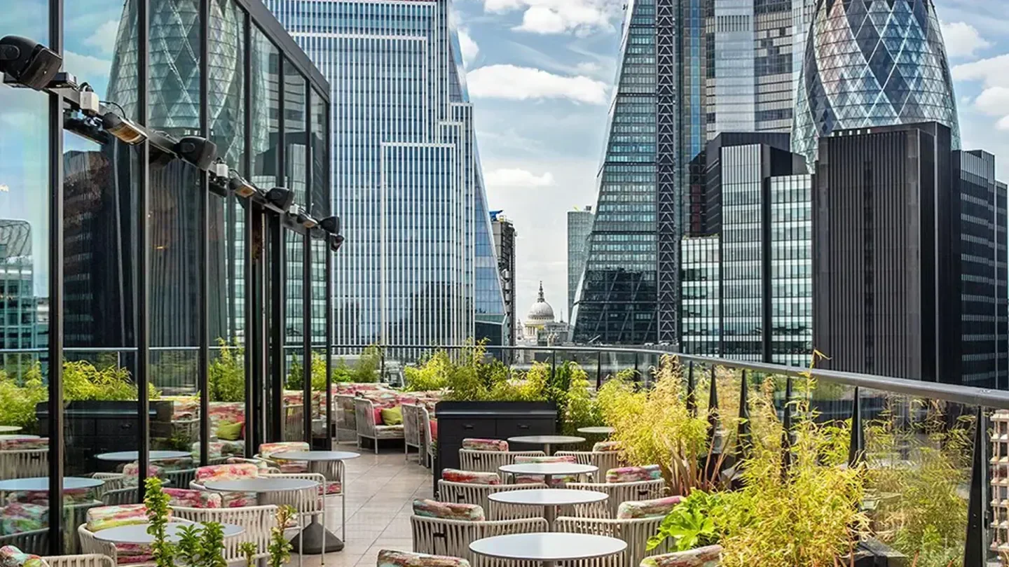 Rooftop view at Florattica London, showcasing elegant seating and the city skyline