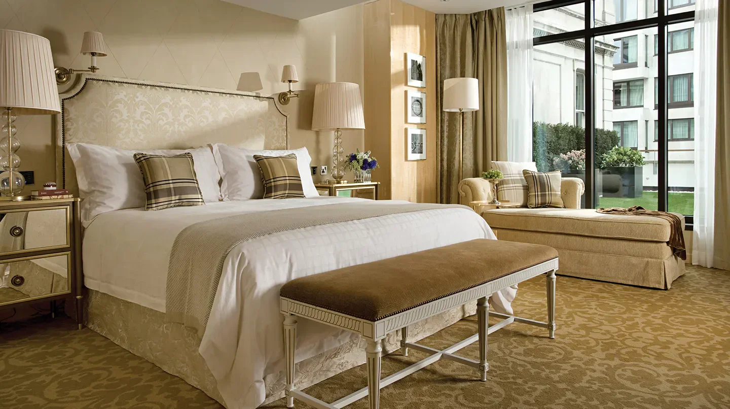 Elegant bedroom at Four Seasons Hotel London at Park Lane, offering luxurious comfort in London.