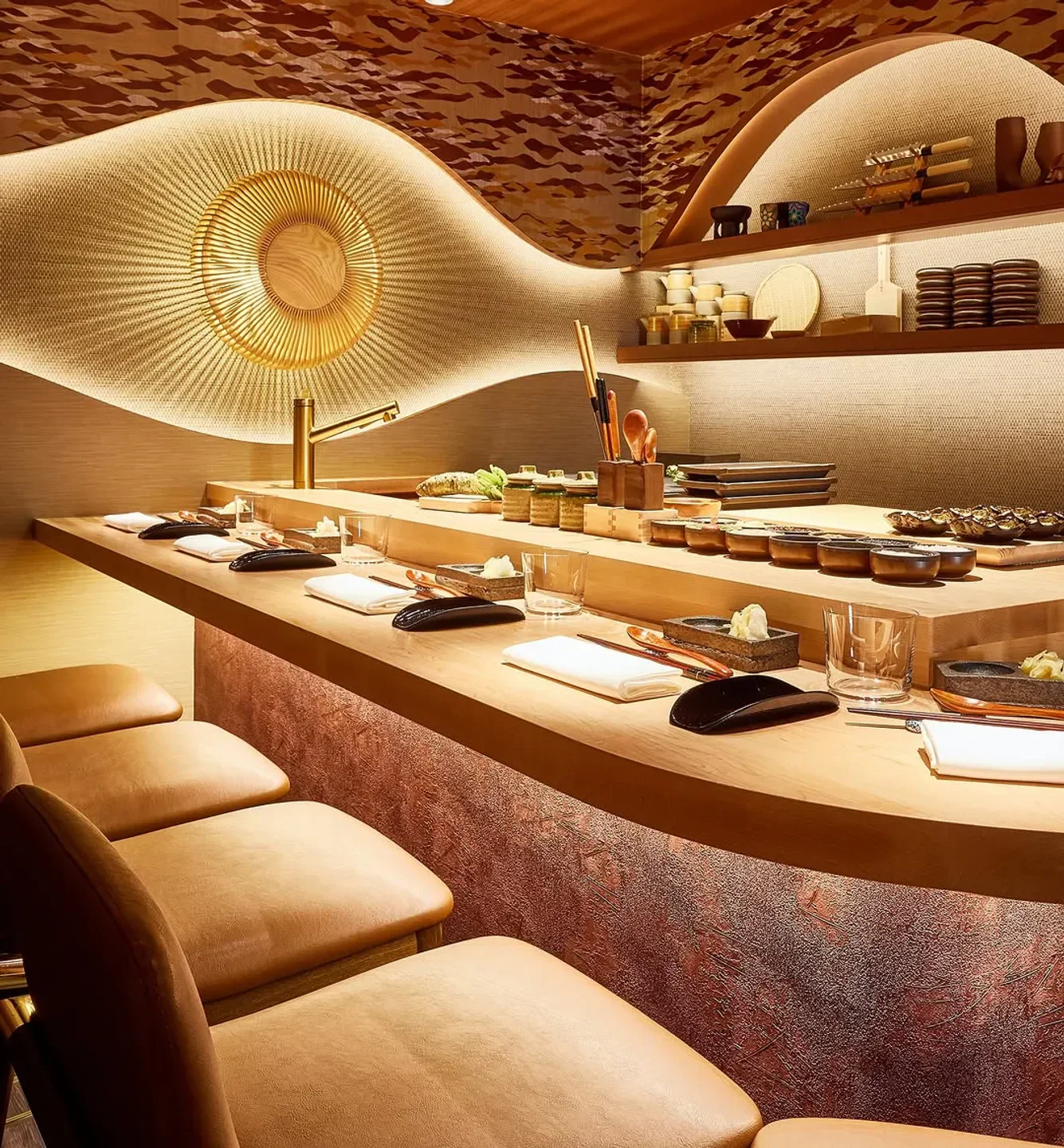 Interior of Juno Omakase in London, featuring sushi bar and elegant design details.