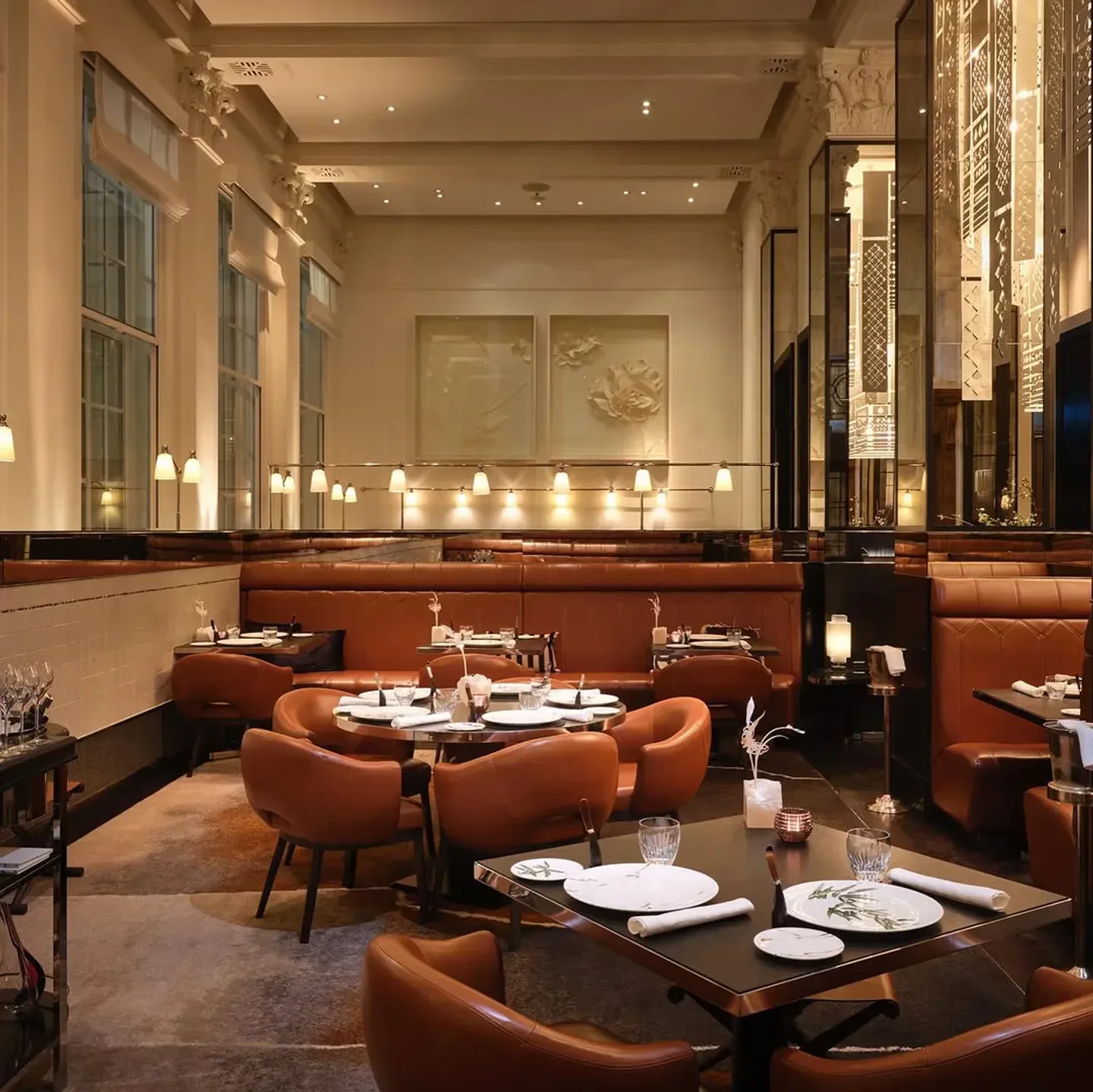 Elegant dining room interior at La Dame de Pic London restaurant in London.