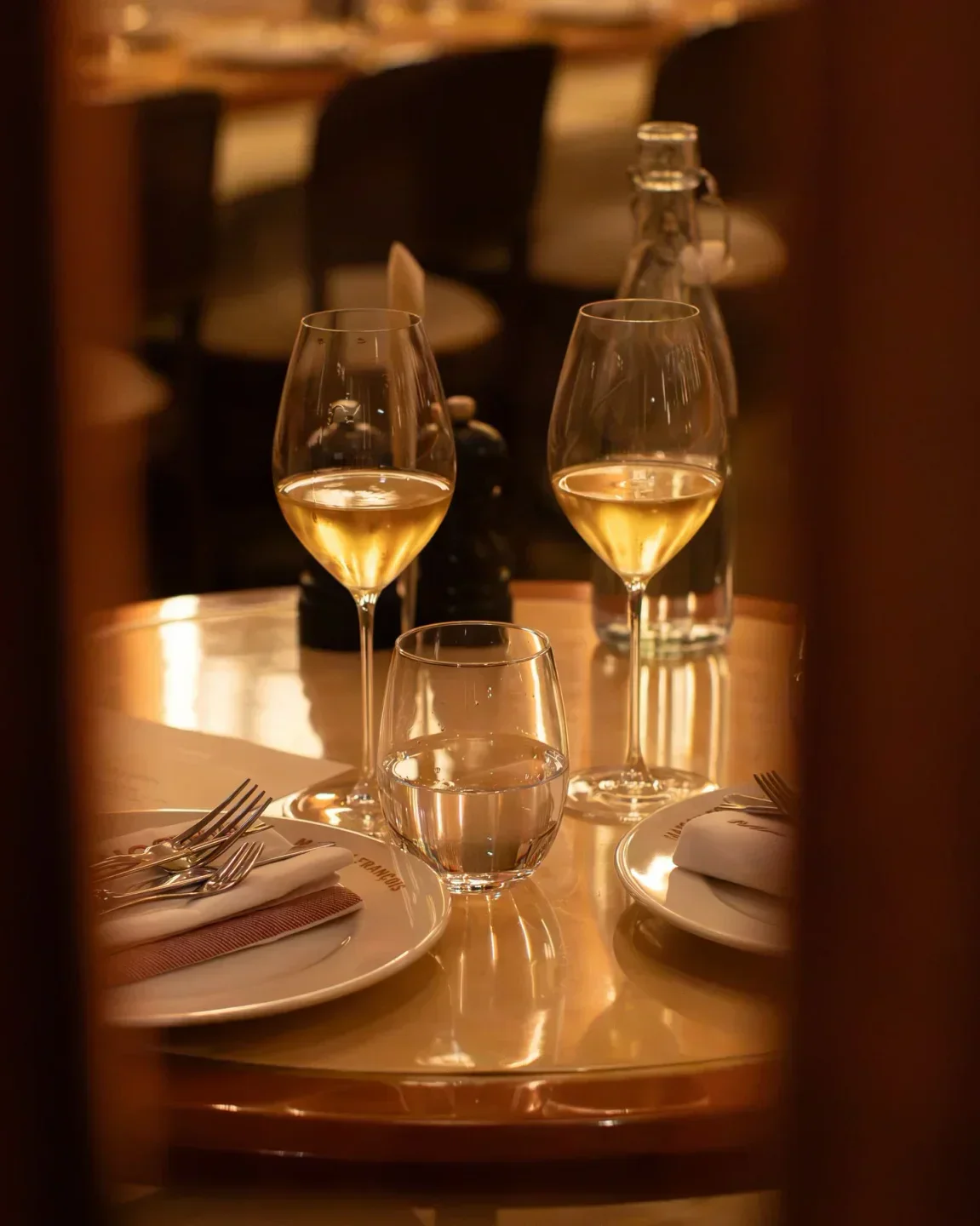 Wine glasses and table setting at Maison Francois in London, a fine dining experience.