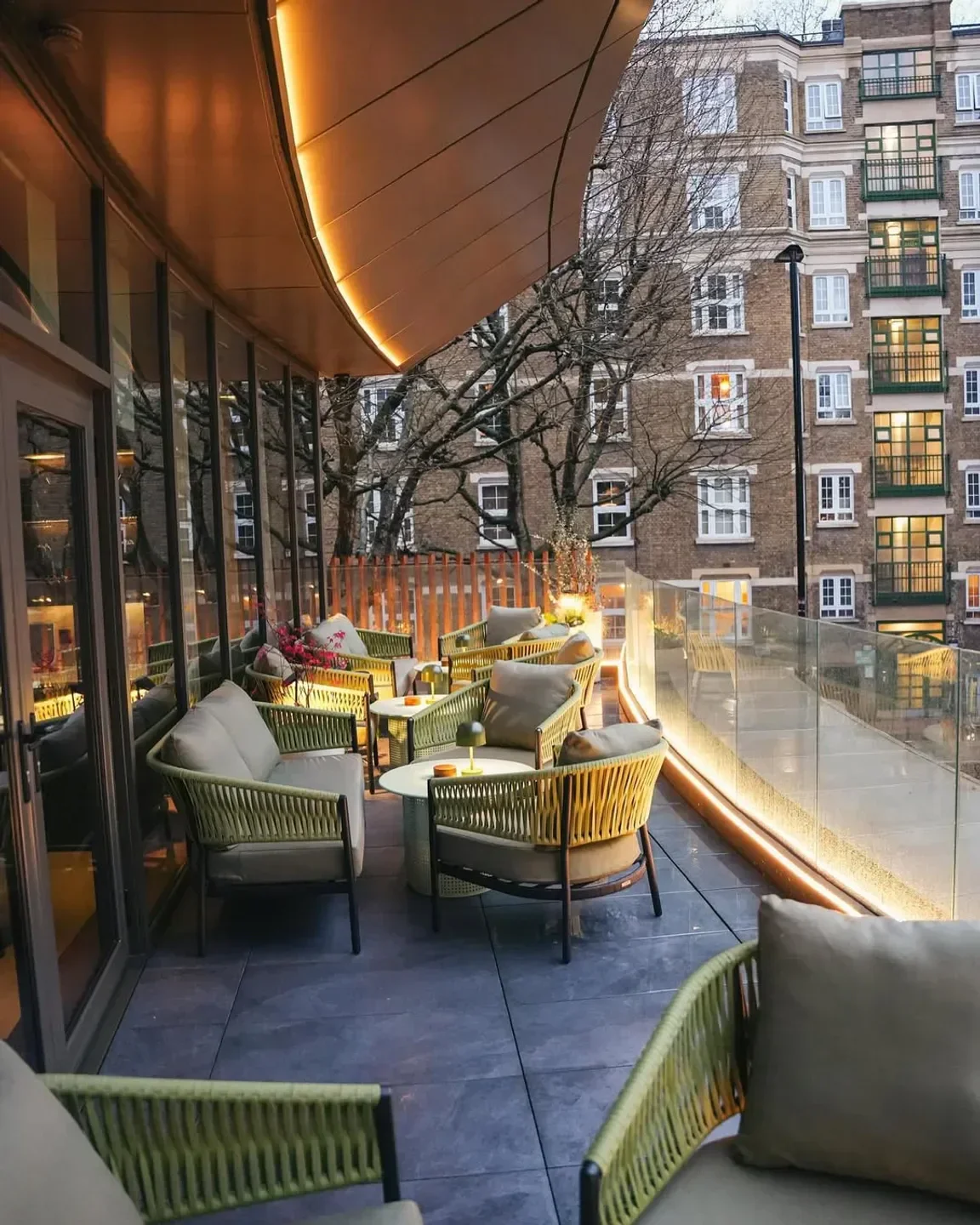 Restaurant Story in London: Stylish outdoor seating area with modern design and city views.