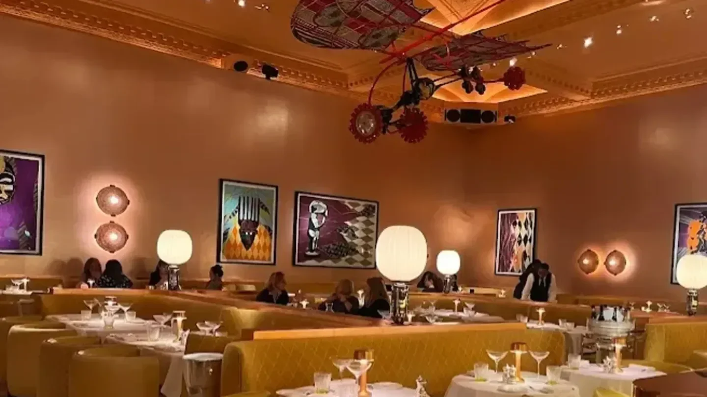 Interior dining space at Sketch restaurant in London, with art and light fixtures