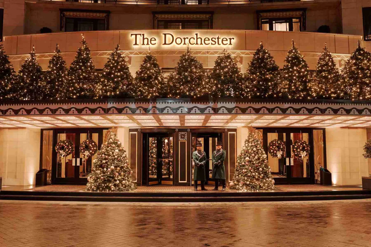 Festive entrance of The Dorchester hotel in London, decorated for the holidays.