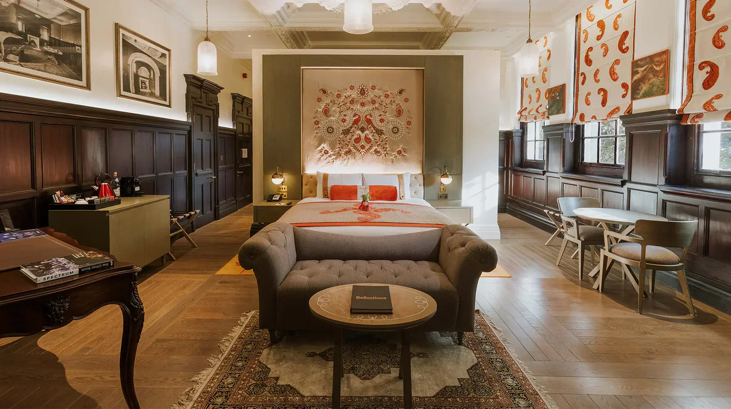 Luxury hotel room at The Lalit London, featuring stylish decor and design in London.