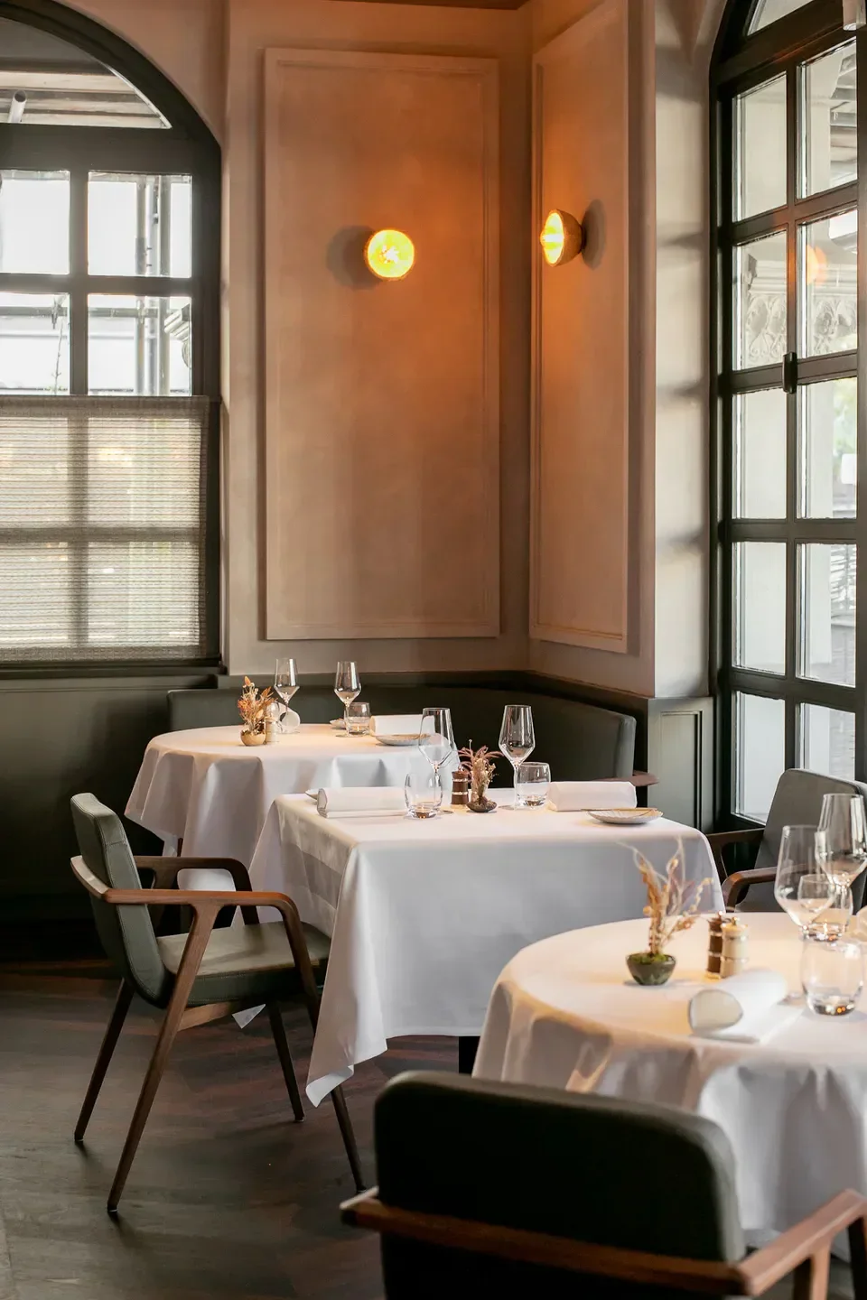 Elegant interior dining space at The Ledbury restaurant in London with table settings.