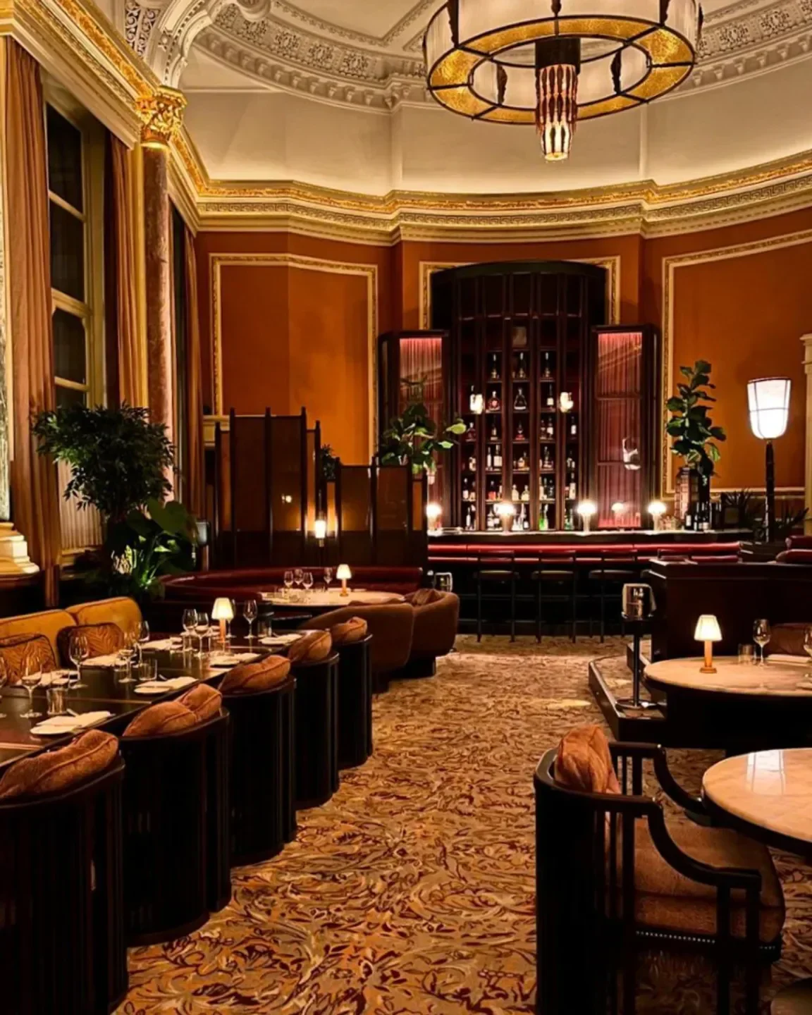Interior of The Midland Grand Dining Room in London, showing elegant dining and bar area.