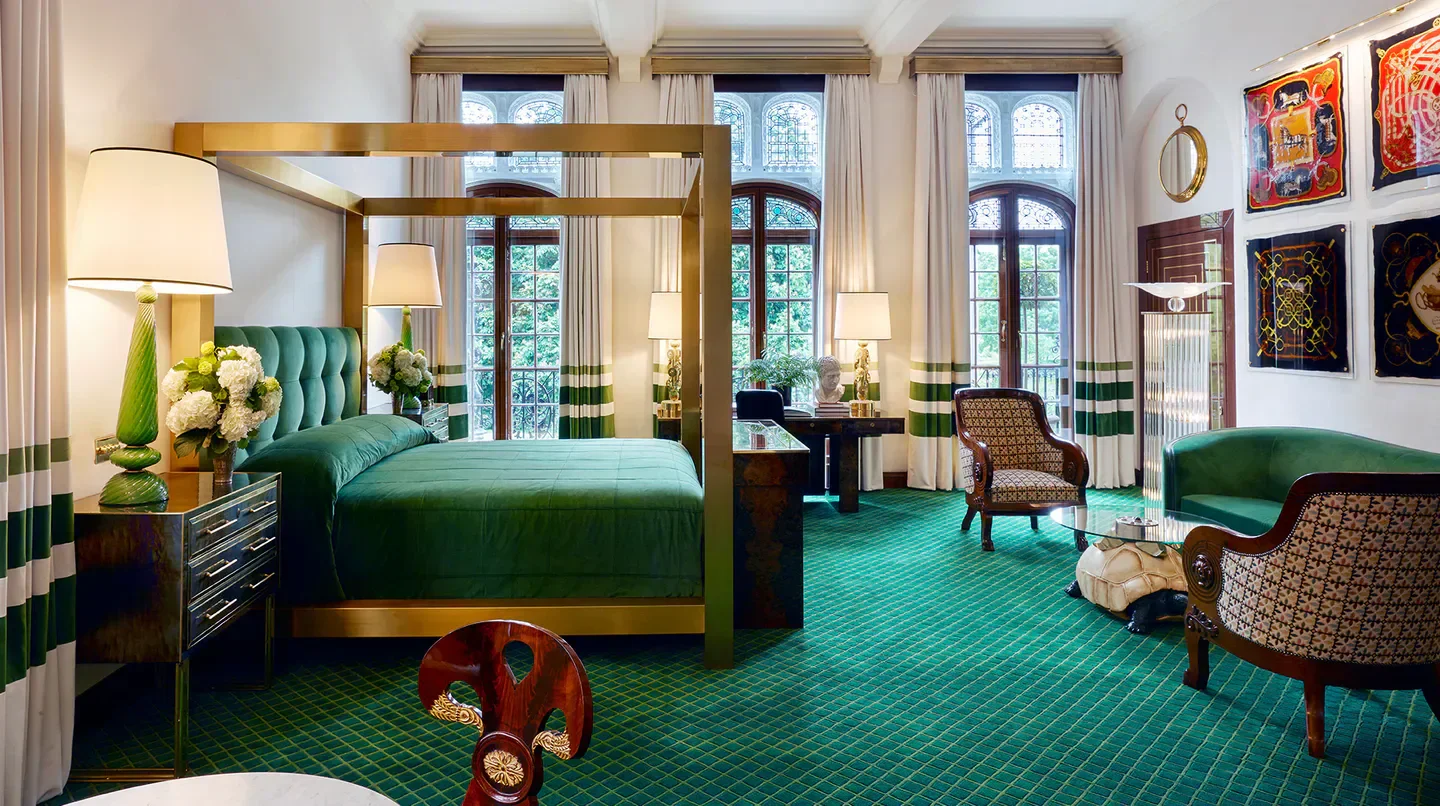 Elegant bedroom at The Milestone Hotel & Residences in London with luxurious green decor