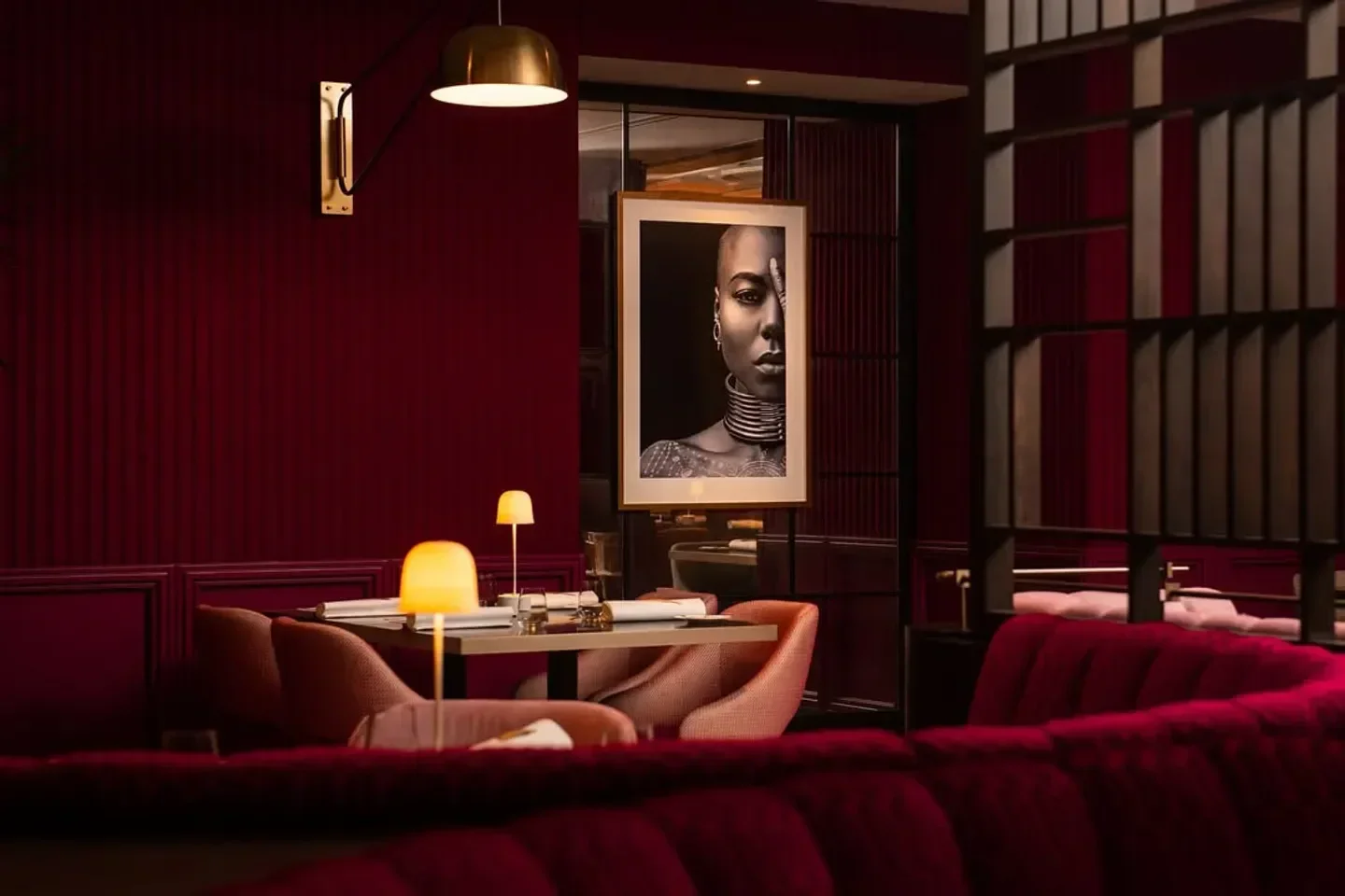 Elegant dining area at The Pem restaurant in London, with striking artwork and lighting