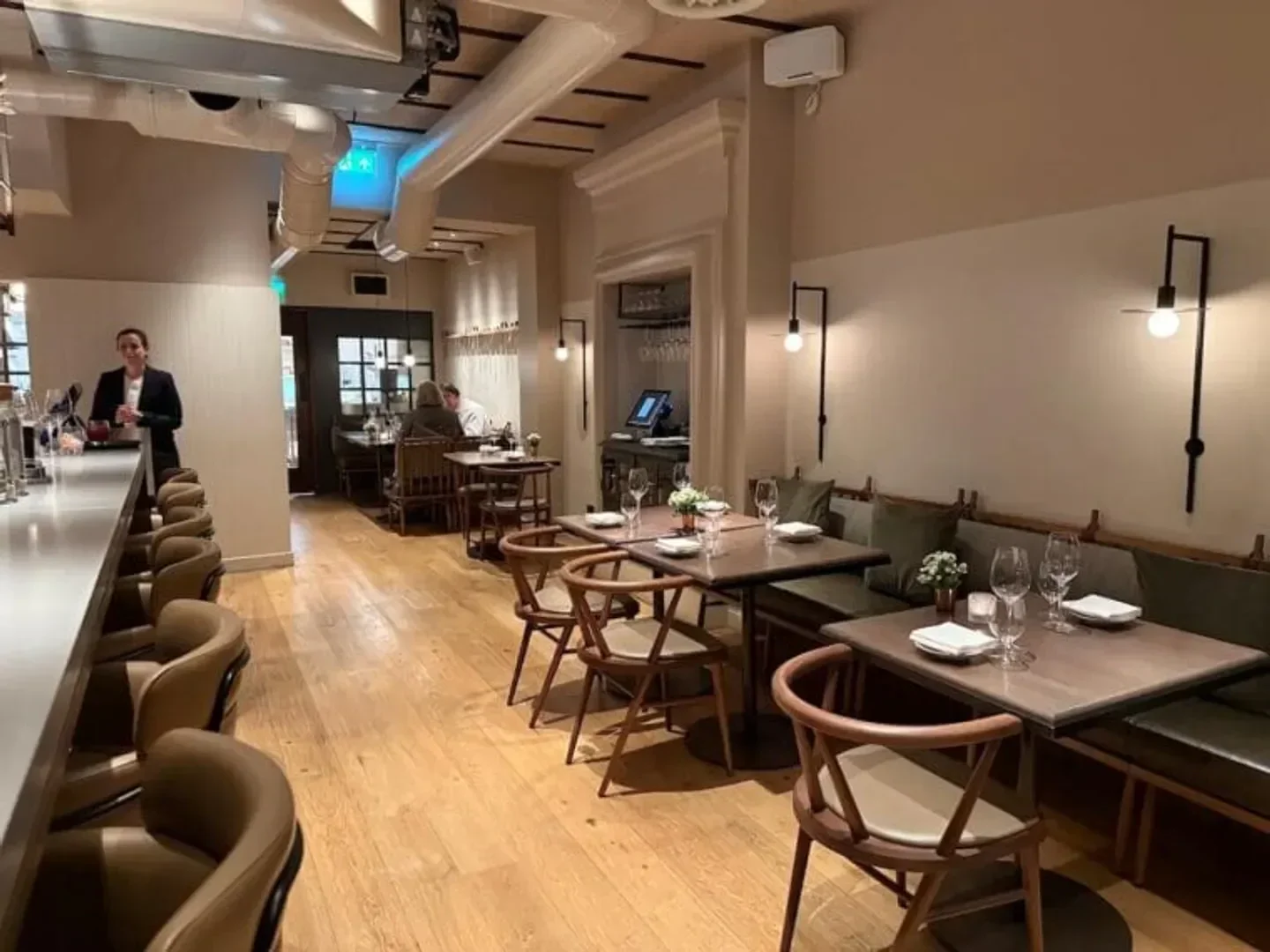 Interior of The Silver Birch restaurant in London, with tables set for dining.