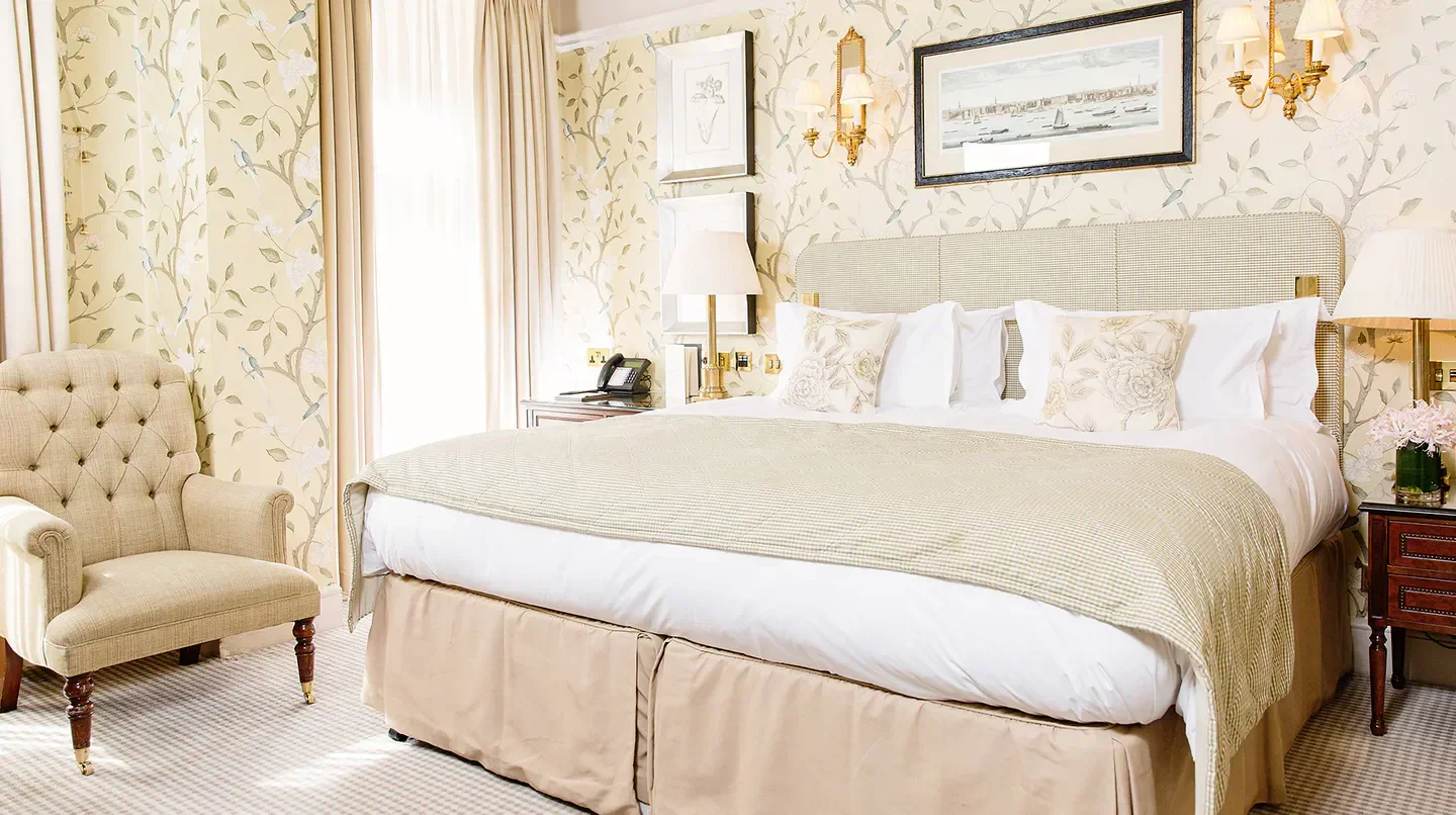 Cozy bedroom at The Stafford London hotel, a luxurious retreat in London.