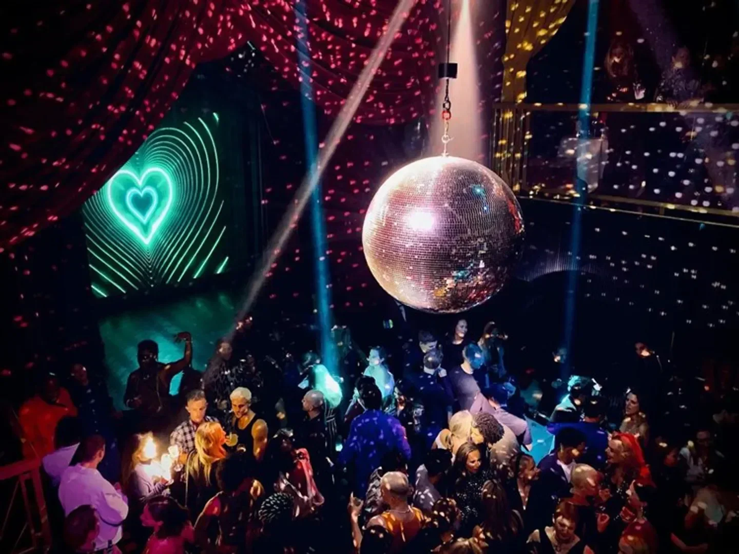 Disco ball and party at The Windmill Soho restaurant in London. Nightlife vibes.